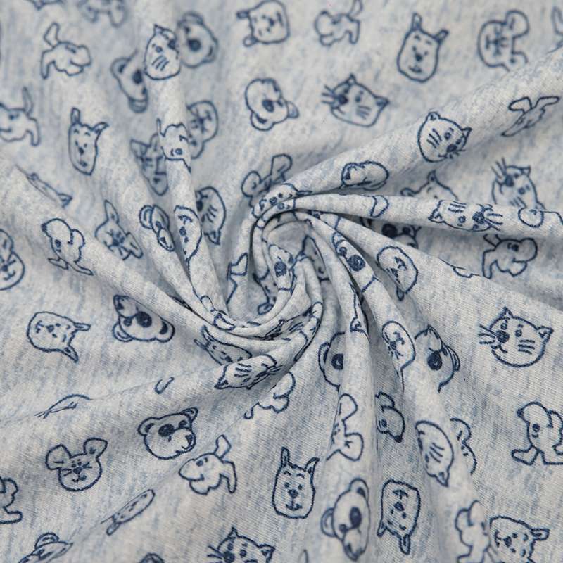 Tissu Jersey Coton Chiens Bleu. Son design ludique et sa qualité