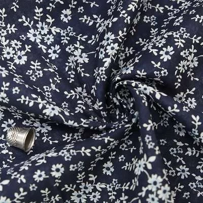 Coton marin à motifs floraux : Créez avec finesse et style