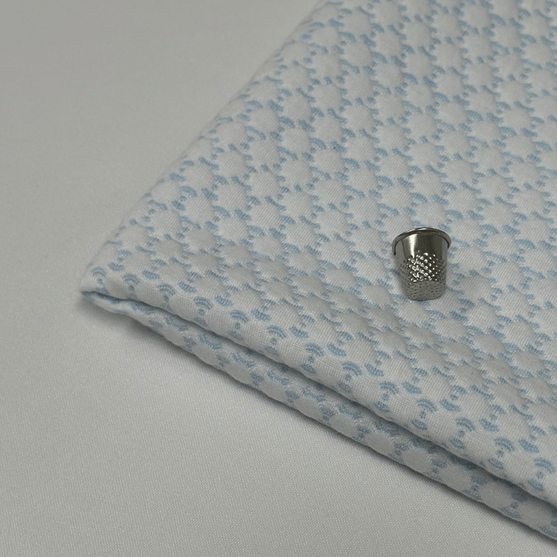 Le Tissu Coton Matelassé Bleu Bébé : Douceur Inégalée