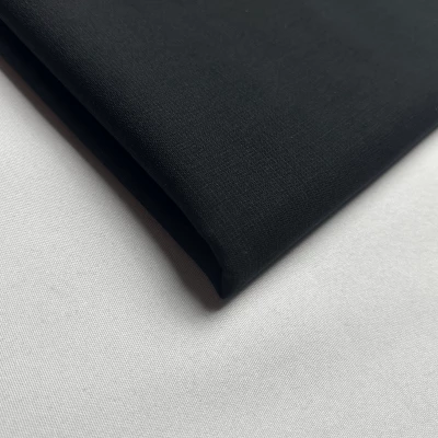 Tissu Laine Uni Noir - Matière Polyvalente pour Couture