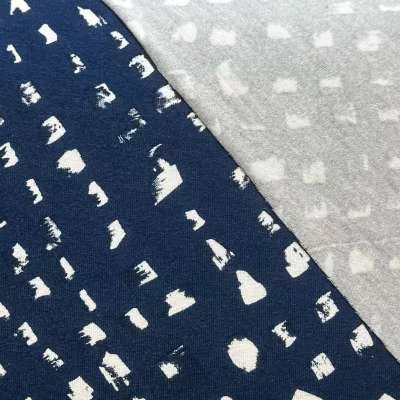 Tissu en jersey de viscose avec petite tache blanche - motif détaillé