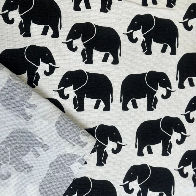 Gabardine de coton imprimée avec motif éléphant noir délicat pour sacs à jouets et pochettes