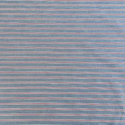 Tissu à rayures rouge et blanc sur fond bleu