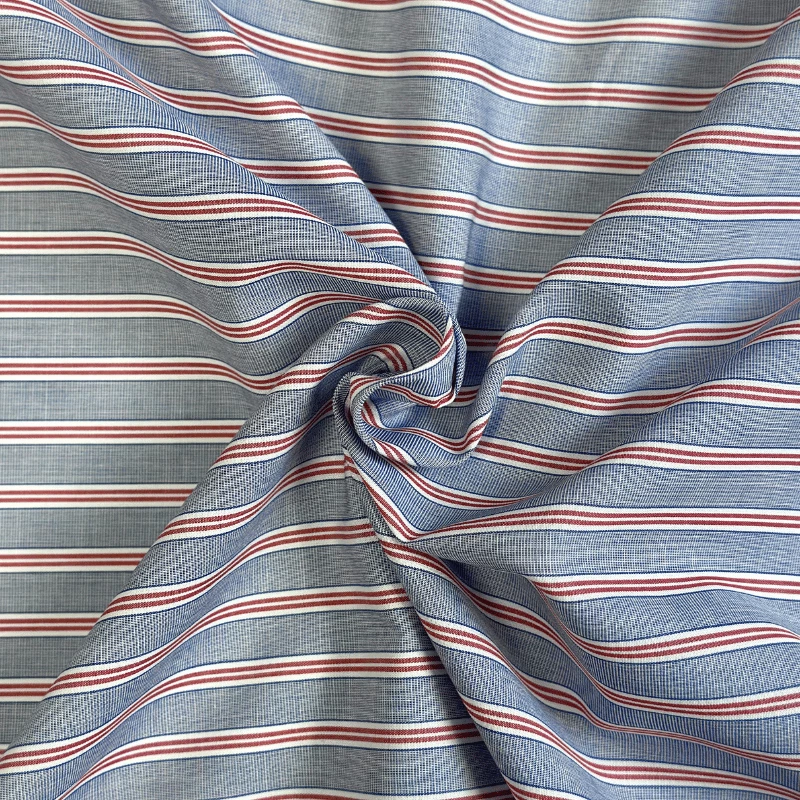 Tissu à rayures rouge et blanc sur fond bleu pour chemises