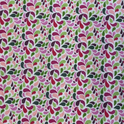 Popeline de coton haut de gamme motif feuilles colorées