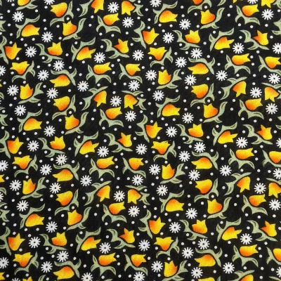 Tissu léger avec motif de petites fleurs sur fond noir