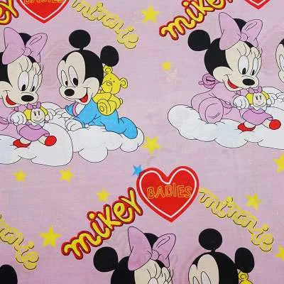 Rouleau de tissu bleu Mickey Mouse en polycoton