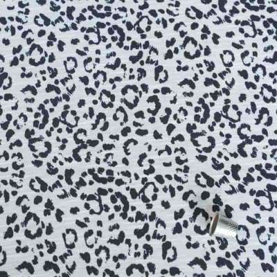 Tissu jersey léopard blanc et noir pour projets créatifs