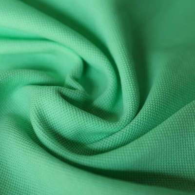 Tissu piqué de coton uni vert