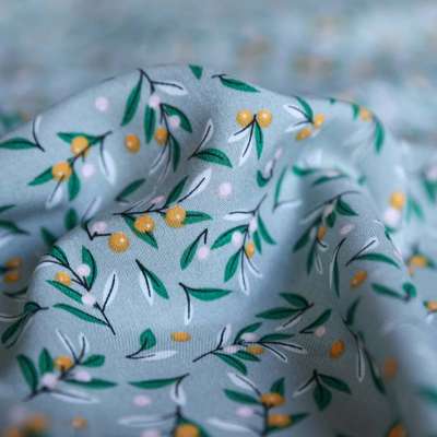 Tissu fibranne viscose imprimé à motif floral vert et jaune