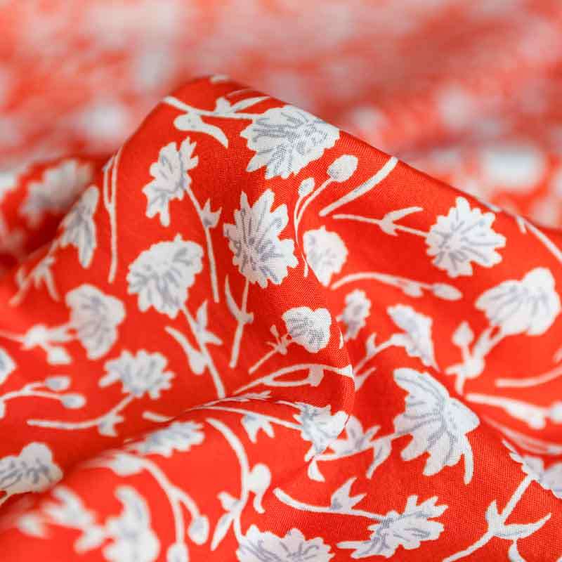 Tissu microfibre orange imprimé floral blanc pour robes féminines