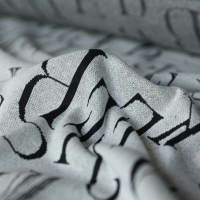 Tissu jacquard gris et noir pour vestes et sweats modernes