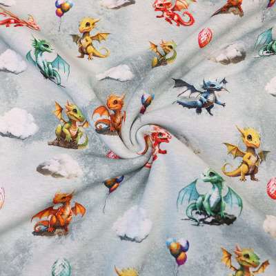 Tissu polaire enfant avec dragons et ballons, parfait pour vêtements cosy