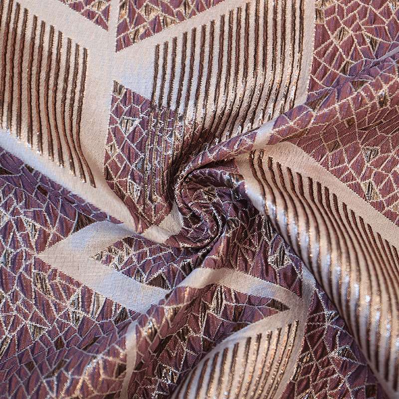 Tissu brocart au motif géométrique en marron et doré