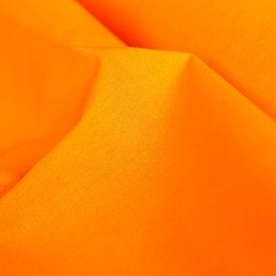 Tissu popeline orange vif idéal pour chemises et coussins