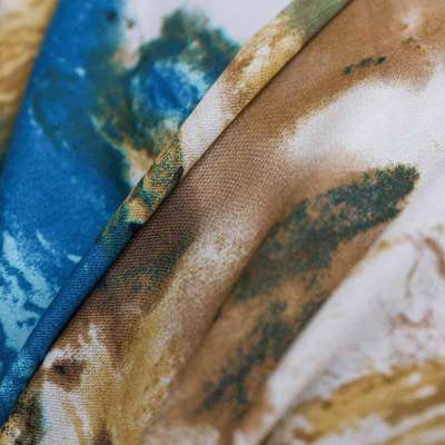 Tissu Wool Peach microfibre aux motifs abstraits bleu, ocre et brun.