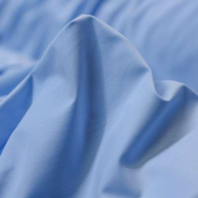 Tissu Uni Bleu Ciel : Parfait pour Maillots Raffinés et Bodys Ajustés