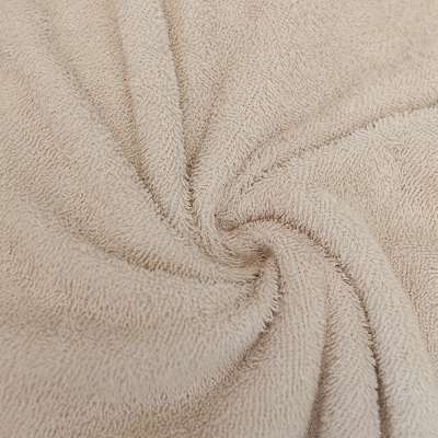 Tissu éponge uni beige, doux et absorbant,