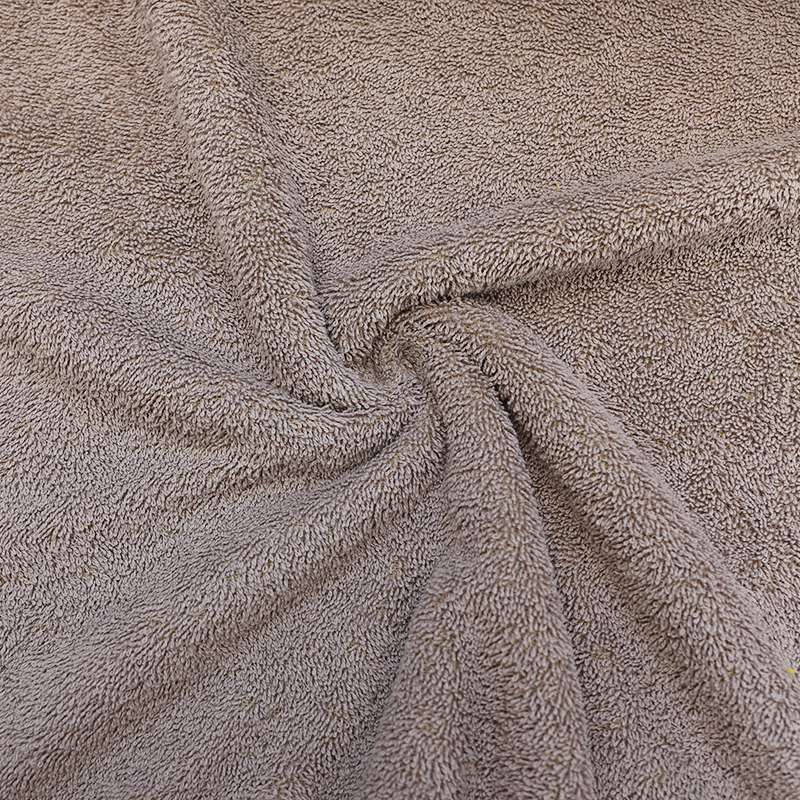 Tissu éponge uni taupe, idéal pour des créations de bain