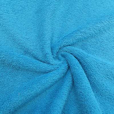 Tissu éponge uni turquoise de qualité premium