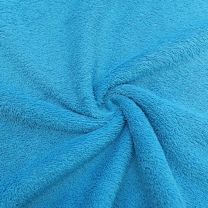 Tissu éponge uni turquoise de qualité premium