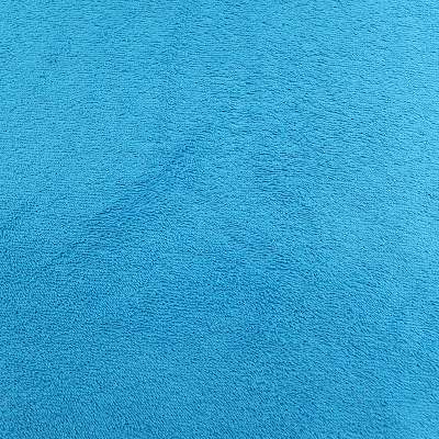 Tissu éponge uni turquoise, offrant une absorption rapide