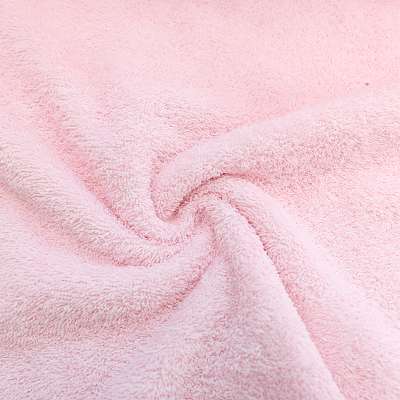 Tissu éponge uni rose pâle, idéal pour des créations de serviettes