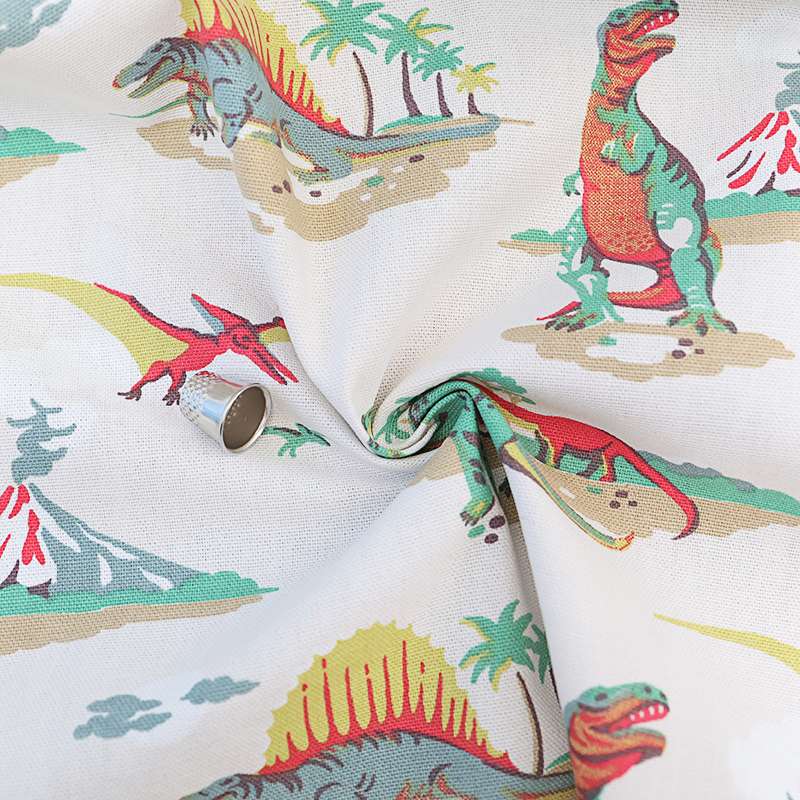 Tissu Natté Imprimé Dinosaures et Volcans – Créations Ludiques pour Enfants