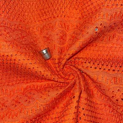 Tissu Broderie Anglaise orange avec imprimé floral éclatant