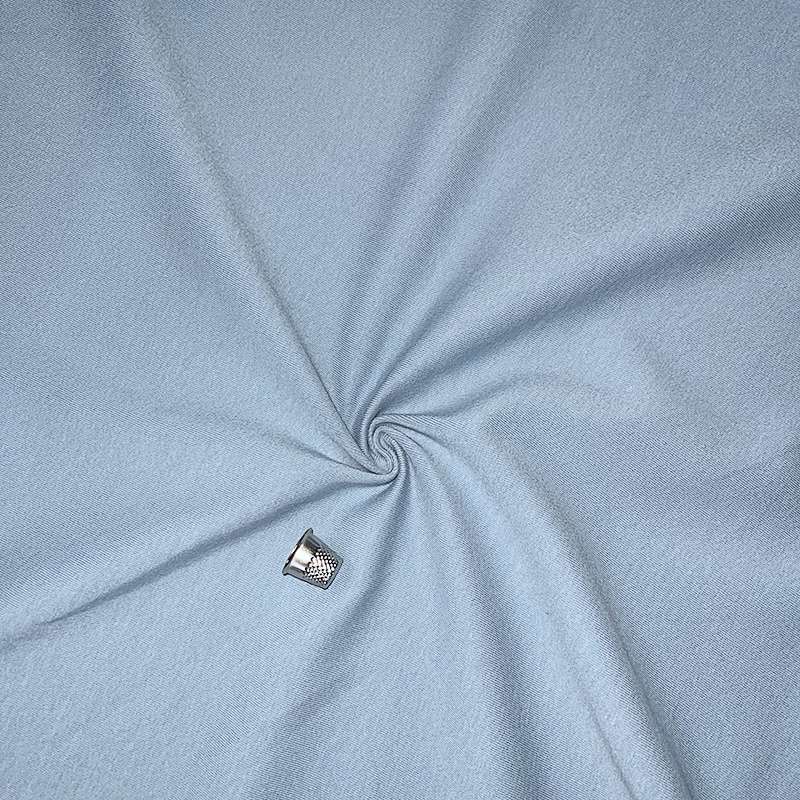 Jersey Milano coton bleu ciel, idéal pour couture élégante et moderne