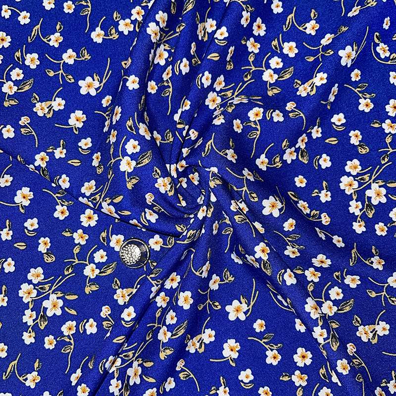 Tissu fibranne viscose bleu roi à imprimé floral et détails brillants