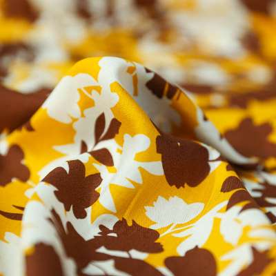 Tissu fibranne viscose floral aux nuances chaudes